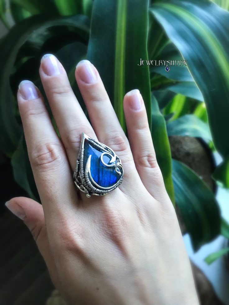 This gothic gemstone fantasy ring wrapped in sterling silver wire with blue Labradorite.                                                                                                                  It can be a unique decoration for a festive occasion or a lovely gift. Jewelry by Jewelryshore -https://jewelryshore.etsy.com Elven Ring, Fantasy Ring, Ring Wire, Medieval Jewelry, Unique Decoration, Blue Labradorite, Jewelry Women, Gothic Jewelry, Wrap Rings