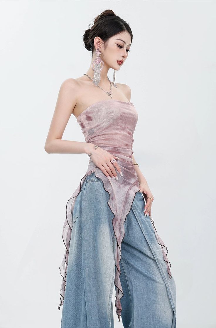 Usher in the summer with a splash of color with our Tie-Dye Ruffled Mesh Tulle Tube Top. 

This piece stands as a testament to the effervescent yet relaxed spirit of contemporary fashion. Crafted from a delicate tulle mesh, this top features a playful tie-dye pattern, giving each piece a unique character. Ruffled edges cascade to enhance the texture, creating an ensemble that is as breezy as it is beautiful. Its slim-fit cut brings a touch of elegance to the casual style, allowing for versatile Ruffle Pants Witb Corset, Rave Bras Summer, Cheap Women's Hawaiian Shirt With Tropical Print, Versatile Summer Tube Top, Luxury Art Silk Dress With Resham Embroidery, Luxury Silk Flapper Dress, Double Layer Ruffle Jeans, Tulle Tube Top, Fashion Mistakes