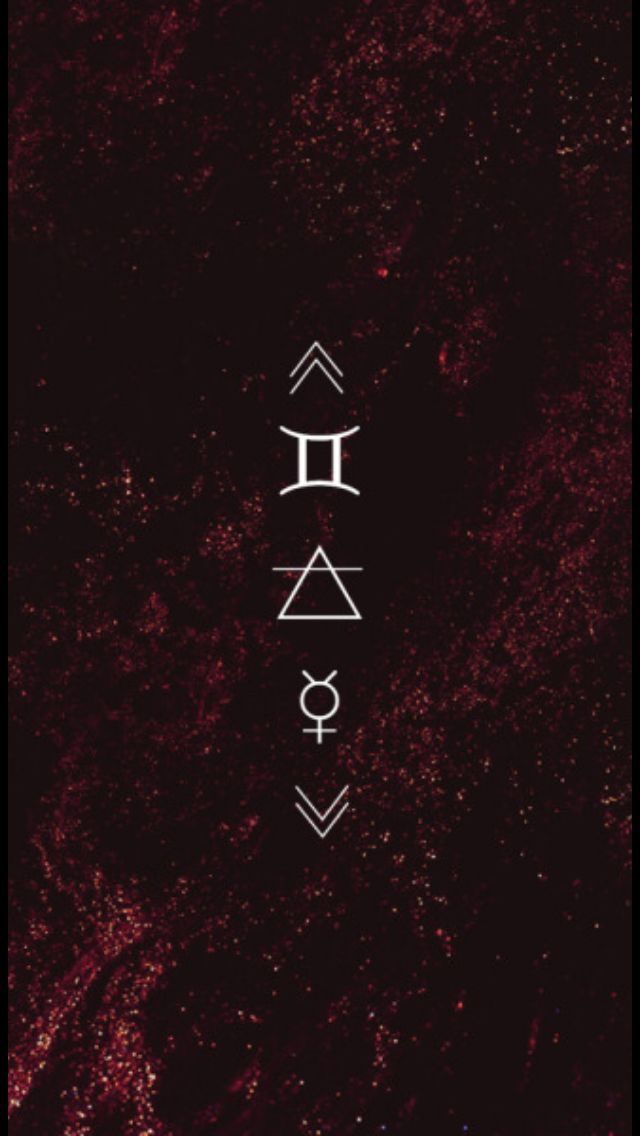 the symbol for love is shown on a dark background