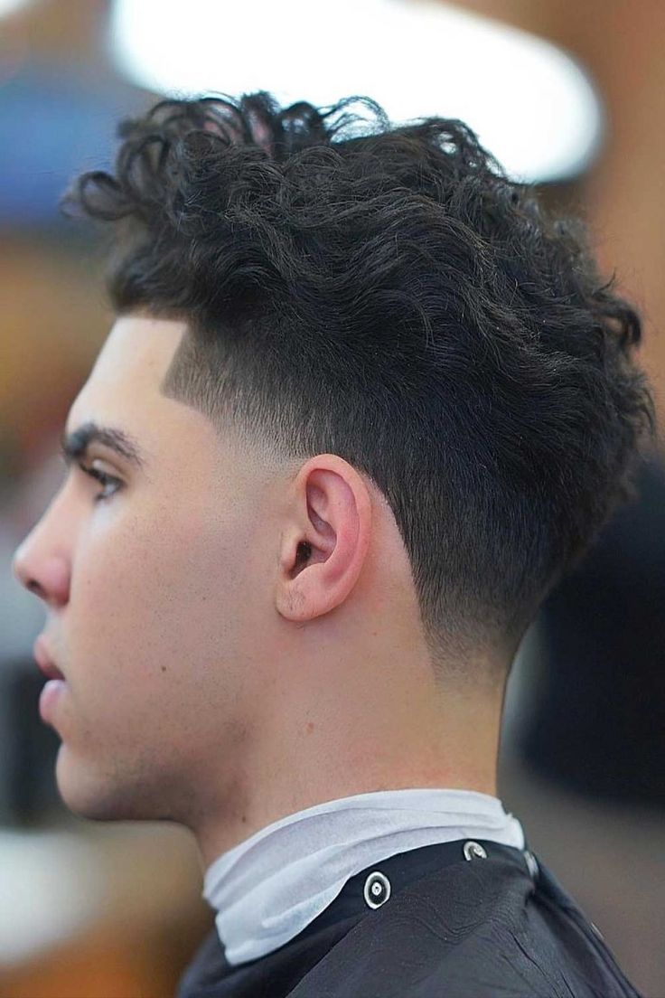 Best Haircuts For Men To Rock In 2020 | MensHaircuts.com Taper Fade Long Hair, High Taper Fade, Low Taper Fade Haircut, Mid Fade Haircut, Taper Fade Curly Hair, Fade Haircut Styles, Low Taper Fade, High Fade Haircut, Drop Fade Haircut