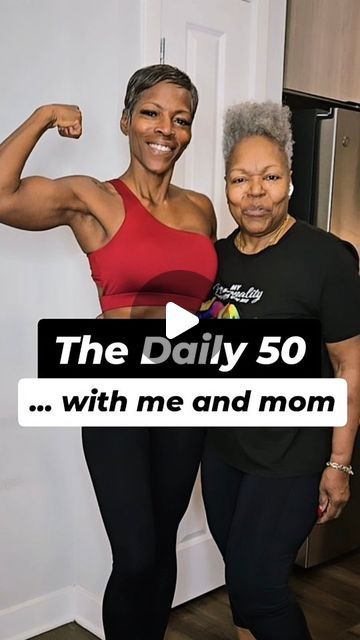 two women posing for the camera with their arms up and one woman showing off her muscles