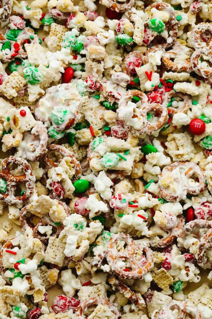 a close up view of some kind of candy popcorn mix with sprinkles