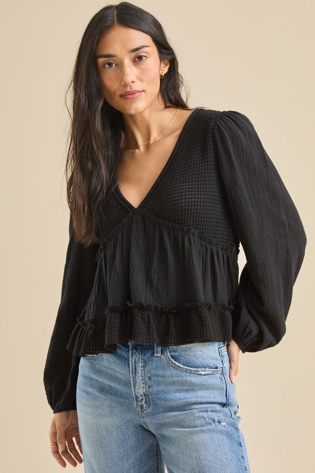 This mixed gauze material babydoll top, offers a cozy yet stylish addition to your everyday wardrobe. With its airy texture and relaxed silhouette, it's perfect for effortless layering or standalone chic. Spring Long Sleeve Cotton Gauze Tops, Spring Flowy Cotton Gauze Tops, Spring Cotton Gauze Top For Loungewear, V-neck Ruffled Tops For Loungewear, Spring Cotton Gauze Flowy Tops, Chic Flowy Tops For Layering, Breezy Long Sleeve Flowy Top, Flowy Long Sleeve Breezy Top, Football Dress