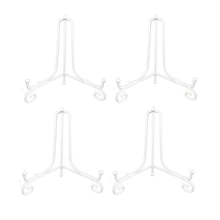 four white metal shelf brackets on top of each other