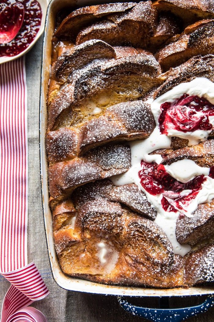 a baked dessert with powdered sugar and jelly