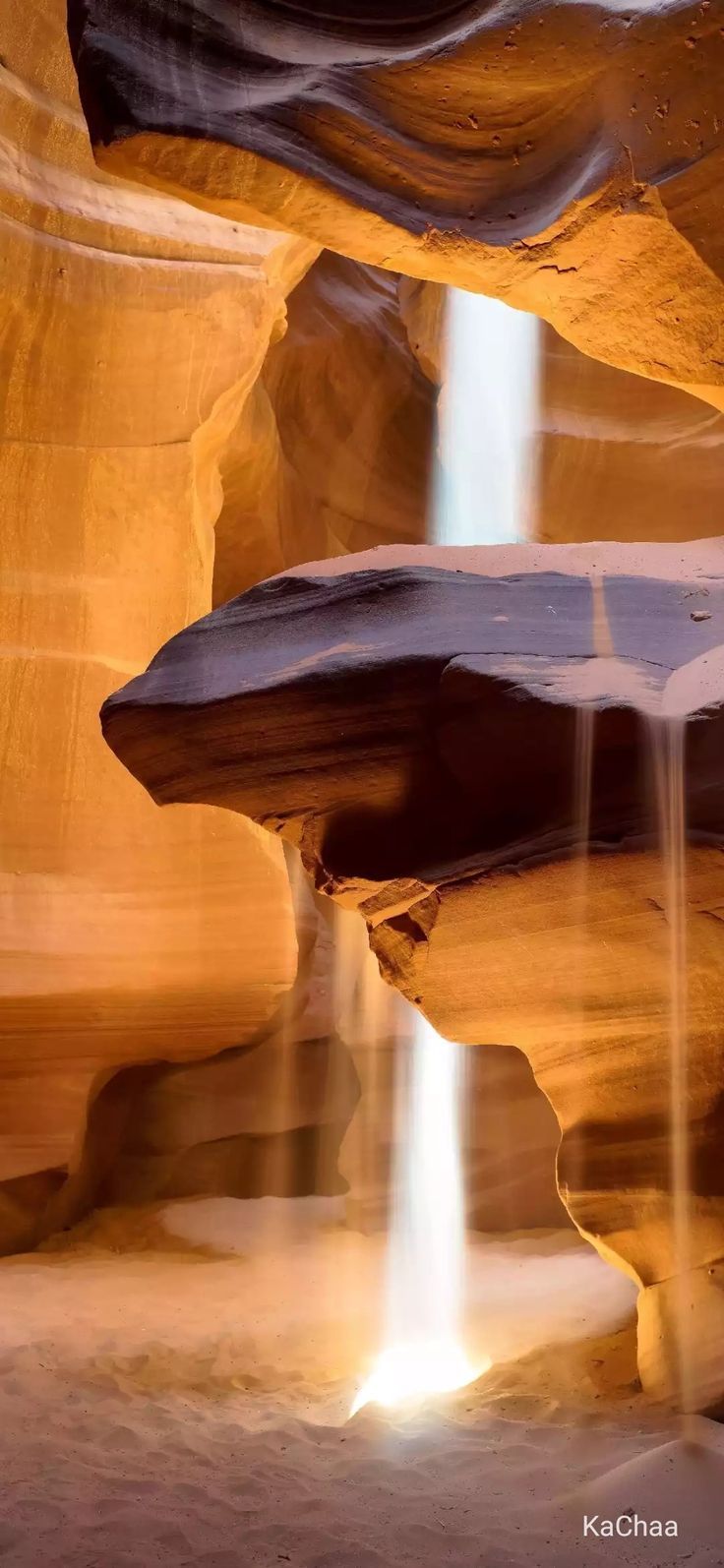 the light is shining through the canyon's water cascadings and streams