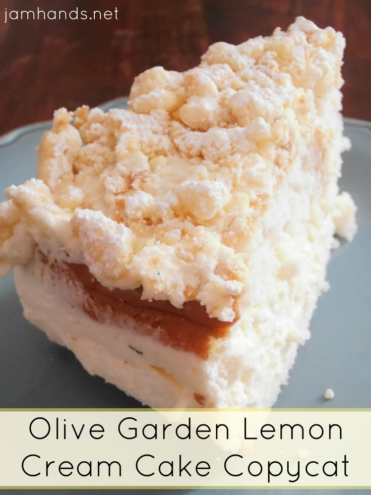 a close up of a piece of cake on a plate with the words olive garden lemon cream cake copycat