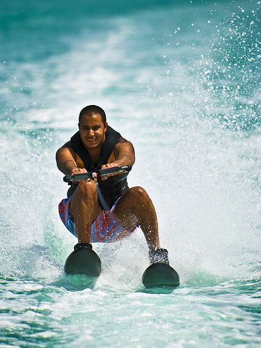 a man is water skiing in the ocean