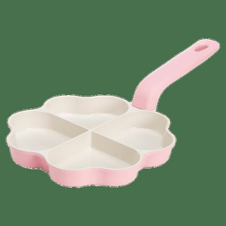 a pink and white tray with three compartments on it, one has a spoon in the middle