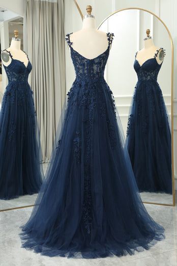 This formal dress features a navy blue Tulle material in an A-line silhouette, with delicate lace appliques and a zip-up back. The full length skirt includes a slit and a built-in bra for added convenience and comfort. SKU: 3407 Navy blue color Tulle material A-line silhouette Lace appliques Zip-up back Full length skirt with a slit Built-in bra Ship in 7-10 business days Size: US 2-16. We offer free returns in 7 days. Please refer to our return policy page for more details. If you have any ques Navy Blue A Line Dress, Navy Blue Dresses Prom, Navy Blue Wedding Dress The Bride, Prom Dresses Navy Blue Sparkle, Prom Dress Midnight Blue, Navy Blue Ball Dress, Navy Blue Prom Dresses Long Flowy, Midnight Blue Prom Dress Long, Dark Blue Sparkly Prom Dress