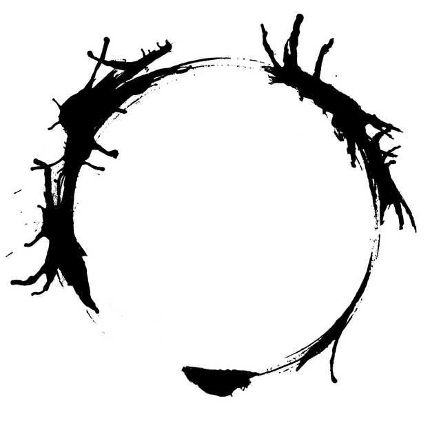 a black and white photo of a circle with branches