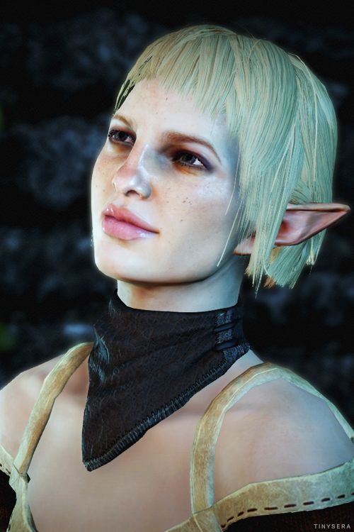 a woman with green hair wearing a black choker and leather collared top, standing in front of a dark background