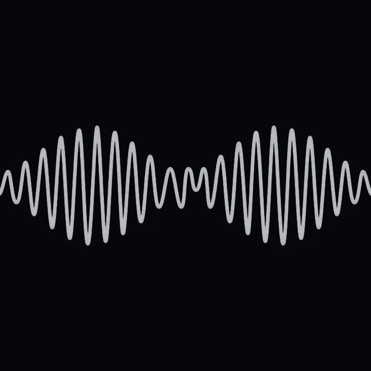 a black and white photo of a sound wave in the dark with no one around it