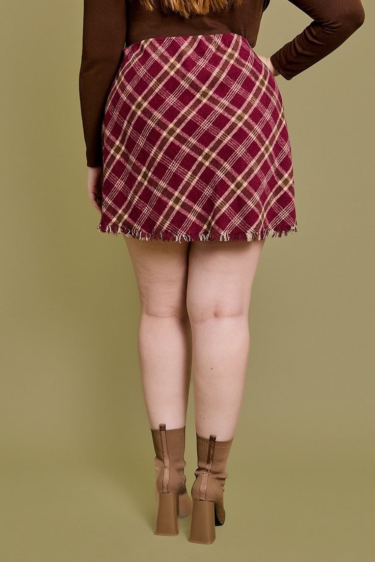 Make a bold statement with the Teagan Plaid Mini Skirt in Burgundy. Bias plaid pattern and frayed hem add a touch of edge to this stylish mini skirt. Perfect for a night out or a day at the office. Dare to stand out with Teagan! Mini Skirt Plus Size, Skirt Plus Size, Plus Size Jumpsuit, Sweater Tank Top, Plus Size Sweaters, Plaid Mini Skirt, Fall Wardrobe, Red Plaid, Plus Size Tops