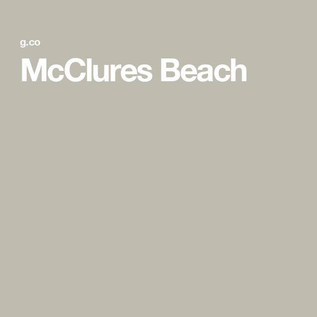 the words mccures beach on a gray background