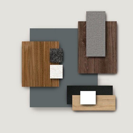 an assortment of wood and tile pieces arranged on top of each other in different colors