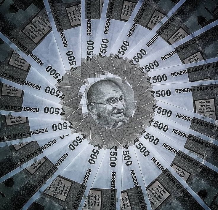 an image of a man's face surrounded by money