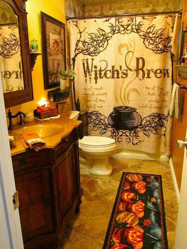 a bathroom with a shower curtain that says,'witch's brew'on it