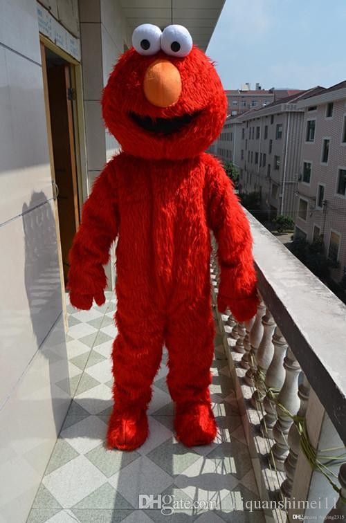 the sesame street character is standing on a balcony