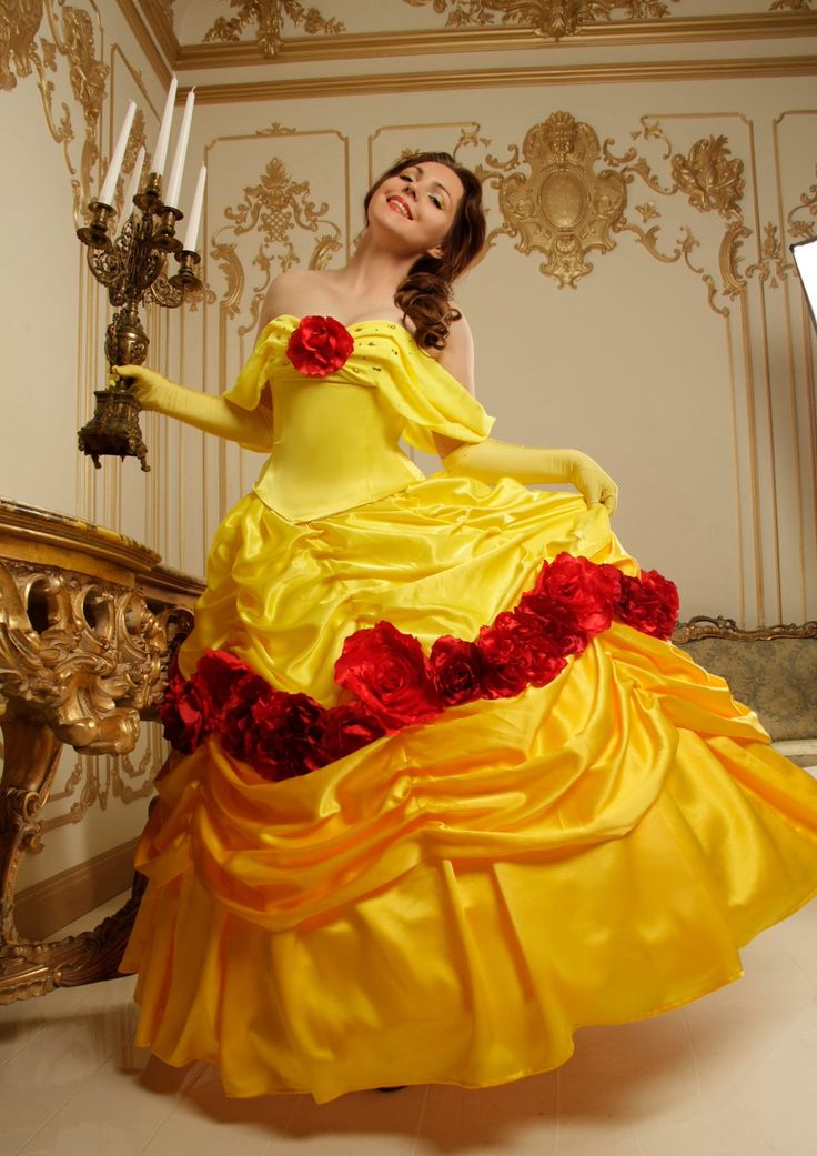 Belle dress is grandiose. This dress is perfect for Belle's flamboyant and unique cosplay. A very beautiful and well-chosen yellow color makes the dress bright, but very pleasing to the eye, and red red roses give the dress a special charm. The set includes a dress (consisting of a corset and a skirt decorated with roses), gloves and a fluffy petticoat. The dress is in two parts; - the corset is very beautifully shaped and has a lacing in the center of the back, which allows you to perfectly adjust the tightening and gives the corset a good fit. The corset is also decorated with chiffon straps, a red rose in the center of the front and bright shiny rhinestones. - The skirt consists of several layers. The upper layer of the skirt is decorated with drapery, as well as beautiful large red ros Red Dress For Cosplay Events, Red Dress For Cosplay Fancy Dress Events, Snow White Costume Dress For Cosplay Events, Red Princess Costume For Fancy Dress, Fantasy Style Dress For Cosplay Events, Red Princess Costume For Costume Party, Fantasy Fancy Dress For Cosplay Events, Red Costume For Cosplay Events, Fitted Red Princess Costume