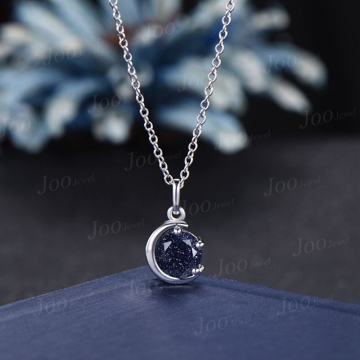 The moon engagement pendant necklace are a popular choice, represents I LOVE YOU TO THE MOON AND BACK , used to express the vastness of one's affection for another. HEALING RING : Blue Sandstone (also known as Blue Goldstone) symbolizes enterprise, success, victory, and glory, which enhance one's leadership and entrepreneurial skills. It is an excellent stone to meditate with before giving a speech or starting a new project. It is also very good at calming the senses and cleansing the chakras on all levels. Blue Sandstone bridges the gap between the earthly and spirit realms, so it is a great stone to use for contacting spirit guides or performing holistic healing. Blue Sandstone resembles the brilliant stars that shine in the dark blue sky, which bring about courage, confidence and willpo Elegant Blue Moon-shaped Necklace, Elegant Blue Moon Shaped Necklace, Elegant Statement Necklace, Entrepreneurial Skills, Blue Sandstone, Pendant Necklace Silver, Blue Goldstone, Necklace Unique, Ring Blue