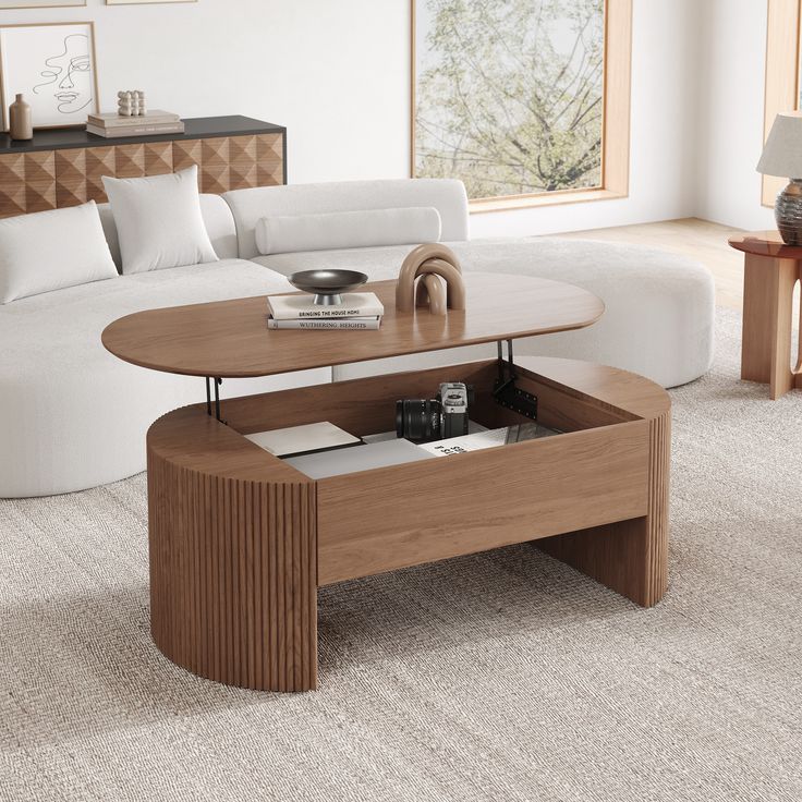 a living room with a white couch and coffee table