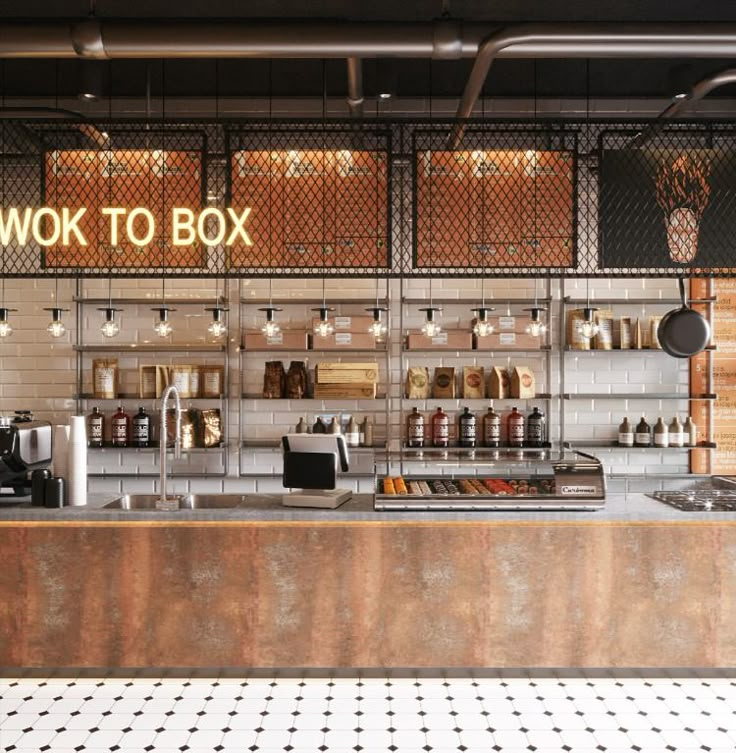 a restaurant counter with lots of items on it and the words wok to box above it