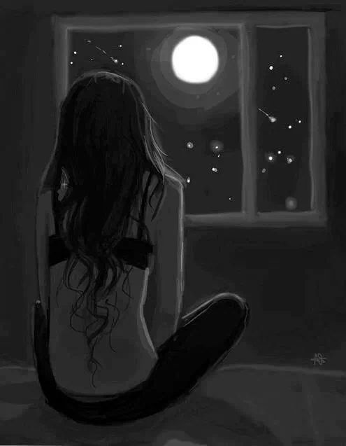 a woman sitting in front of a window looking out at the moon