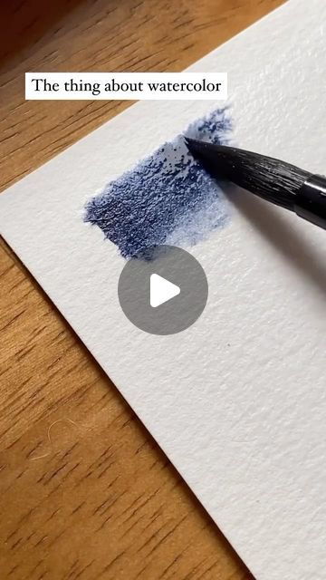 the ink is being used to create an art project with watercolors on paper