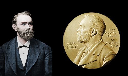 a man in a suit and tie next to a gold medal with an image of abraham lincoln