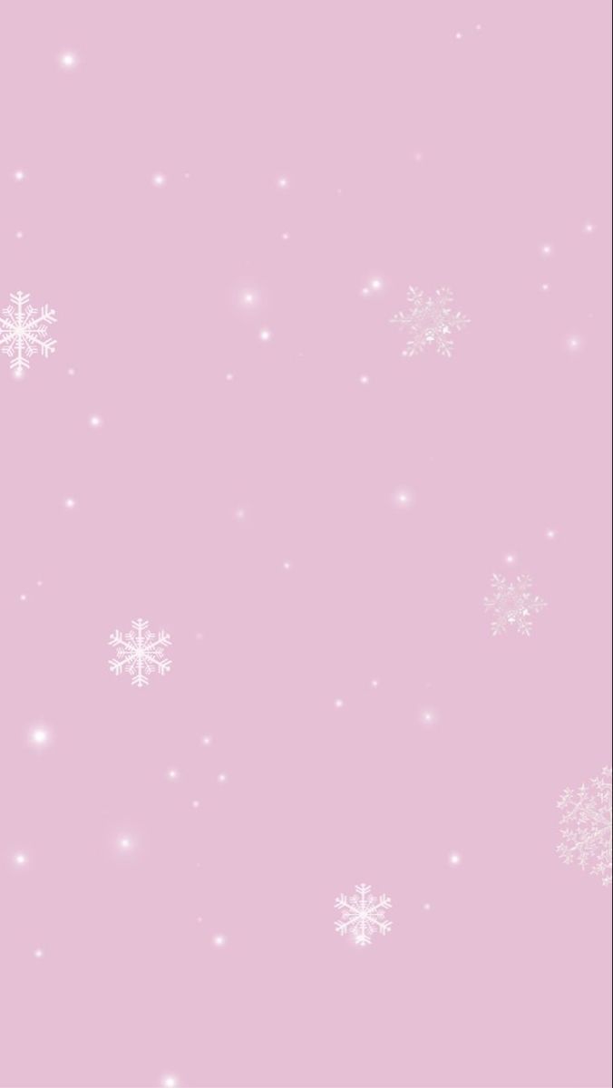 a pink background with white snowflakes and sparkles on it's edges