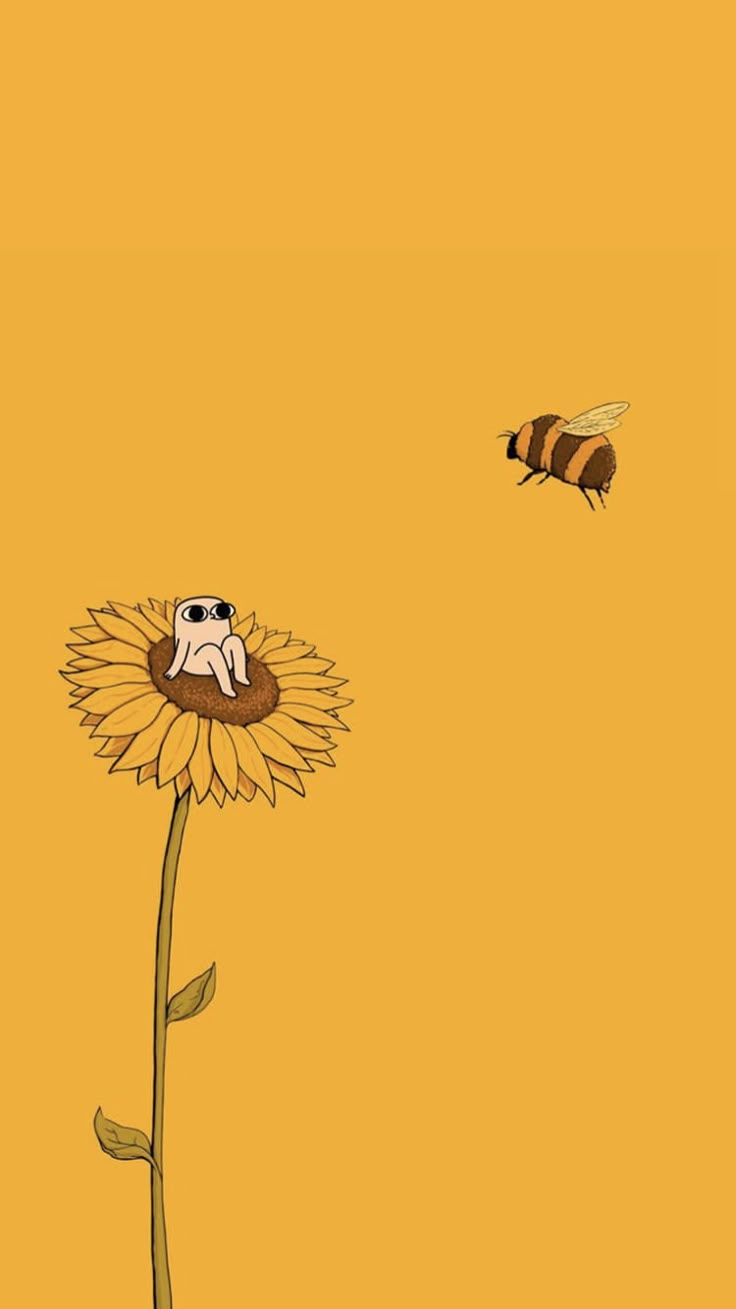 two bees are flying over a sunflower and another bee is sitting on the flower