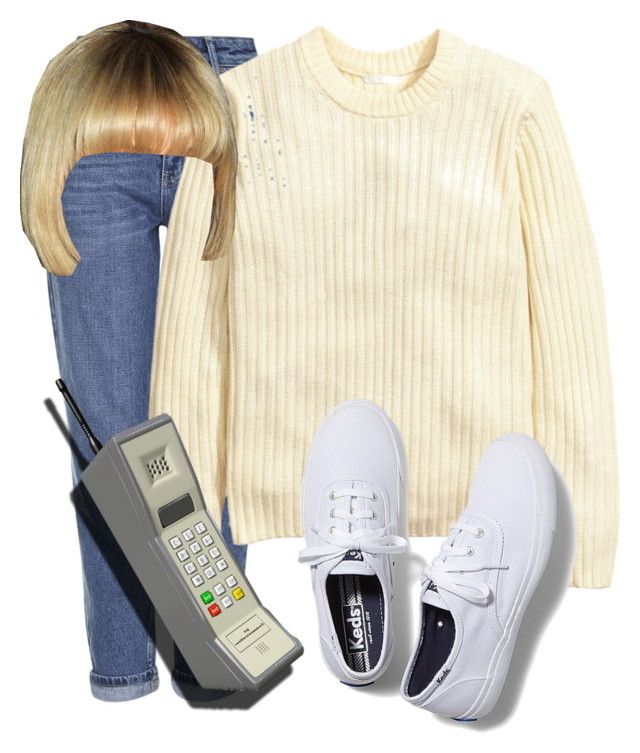 a woman in white sweater, jeans and sneakers with cell phone next to her leg