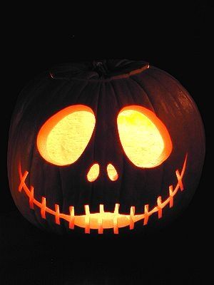 a jack o lantern pumpkin with glowing eyes