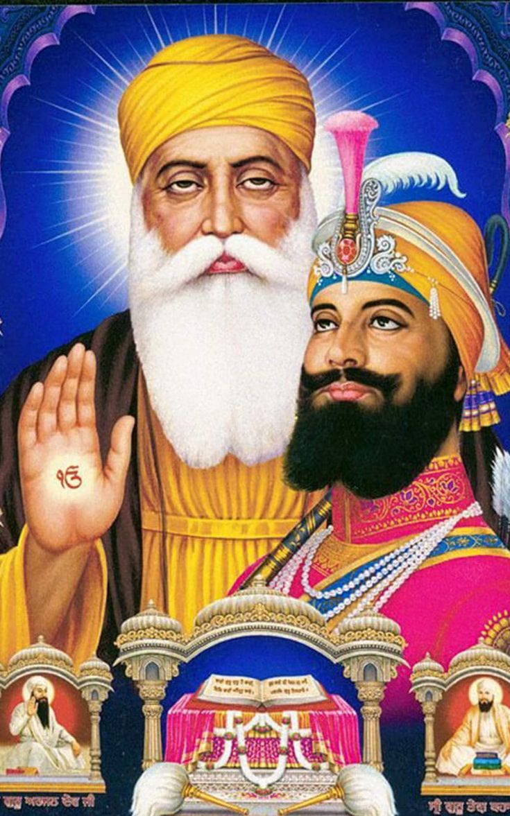 two men with beards and turbans standing next to each other