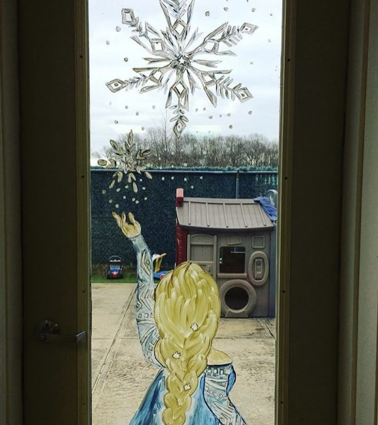 an image of a frozen princess looking out the front door with snowflakes on it