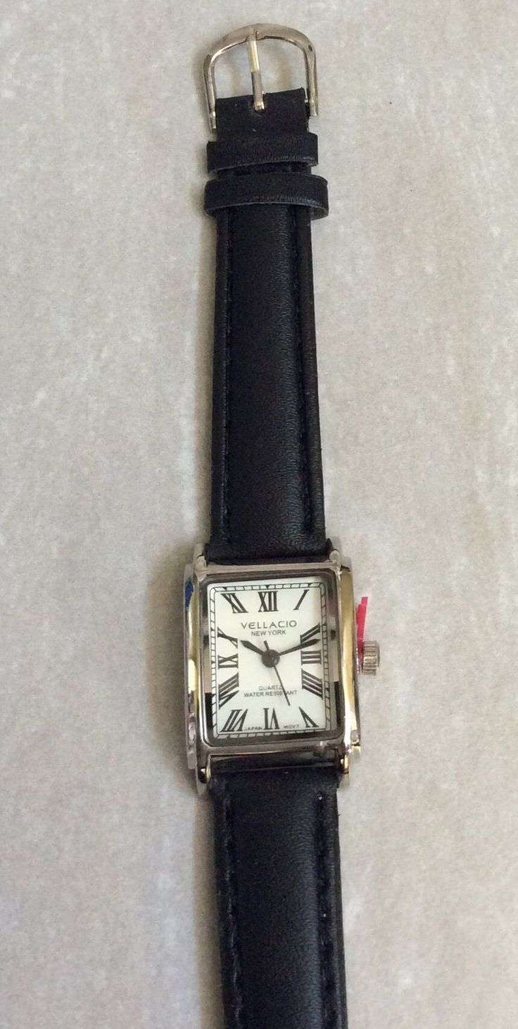 Vellacio women's silver rectangle watch, having a Rectangle white dial, displaying easy to read Roman Numeral Hours, all on a black leather band. This is a New unused Vintage Watch, works perfectly, ready to be cherished & enjoyed and keep you up with accurate on-time display! Measurements: Bezel/Case 1 1/8" x 3/4", Dial 3/4" x 5/8", Band Width 1/2" and fits a 5 1/2" up to a 7" wrist. We ship fast, the next business day for a quick delivery to you. May you have a wonderful time shopping, best wishes! Cheap Modern Rectangular Watch, Rectangular Analog Watches For Everyday Use, Rectangle Watch, Hand Watch, Roman Numeral, Women Wrist Watch, Women's Watch, White Dial, Roman Numerals