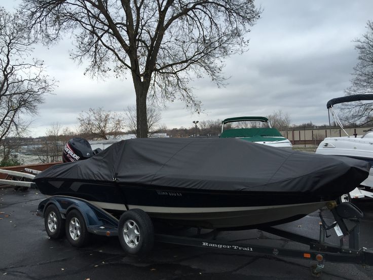 a boat is parked in the parking lot