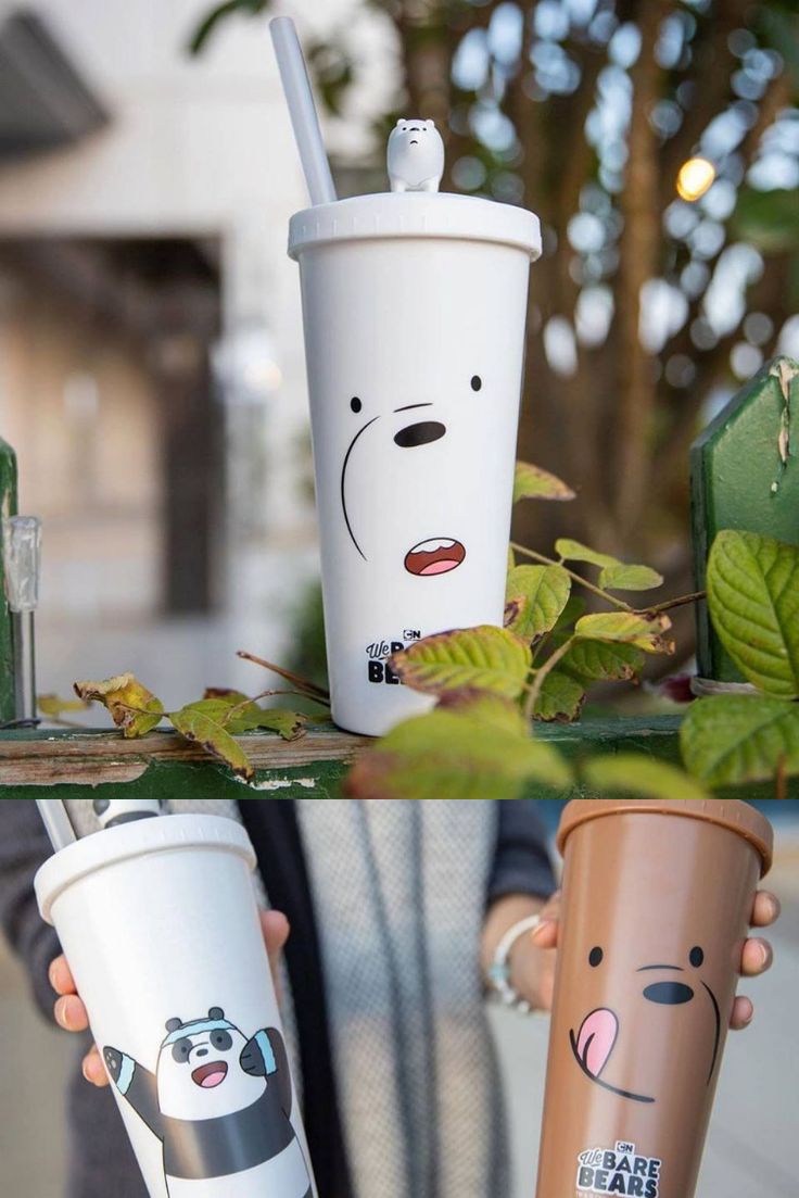 two coffee cups with faces drawn on them, one has a straw and the other has a panda face