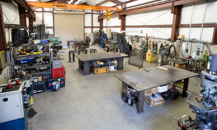 a garage with tables and tools in it