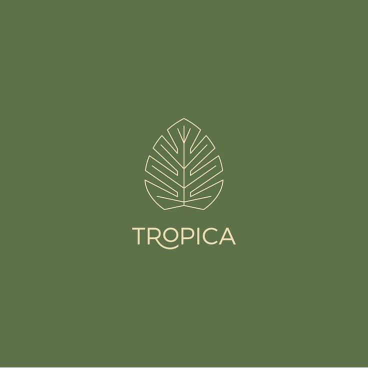 a green background with the word tropicaa written in gold on top of it