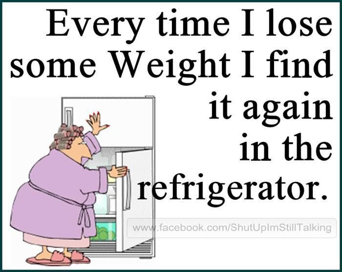 an old woman is trying to open the refrigerator with her hand on the freezer door