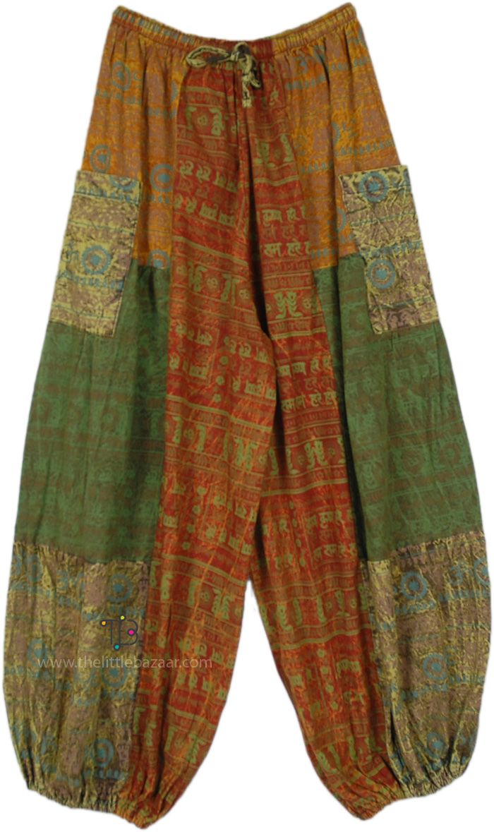 A pair of tropical bohemian handmade hippie print balloon style harem pants.  These pants feature a mesmerizing hippie-inspired print and style that channels the free-spirited vibes of the 60s and 70s. #tlb #SplitSkirtsPants #Patchwork #bohemianfashion #Handmade #Patchworkcottonpants #hippieharempants Patchwork Harem Pants, Multicolor Bohemian Pants With Boho Print, Green Baggy Harem Pants In Hippie Style, Baggy Green Hippie Harem Pants, Multicolor Boho Print Wide Leg Harem Pants, Multicolor Boho Print Wide-leg Harem Pants, Multicolor Wide-leg Boho Print Harem Pants, Multicolor Harem Pants With Pockets, Spring Boho Print Harem Pants