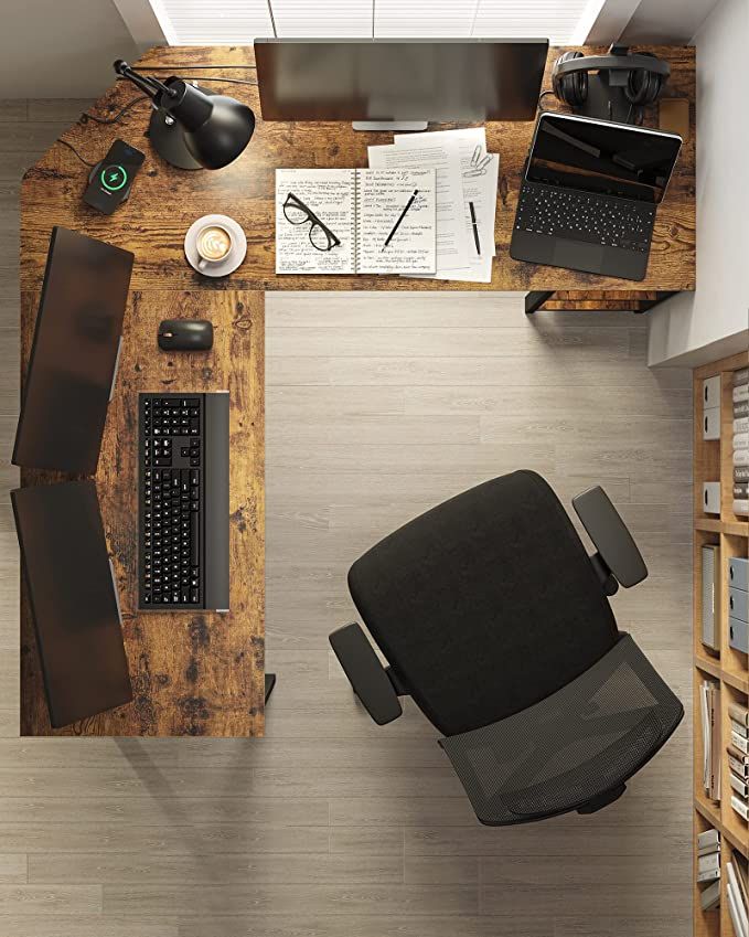 an overhead view of a desk and chair