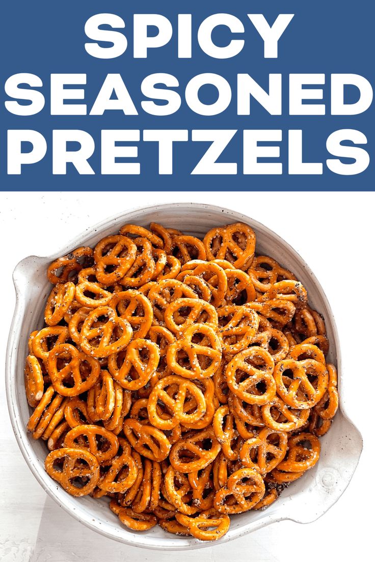 a bowl full of spicy seasoned pretzels with the title overlay above it