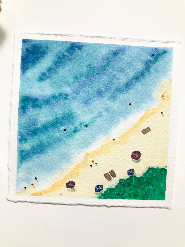 a watercolor painting of a beach scene