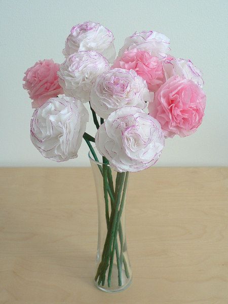 two pictures of pink and white flowers in a vase