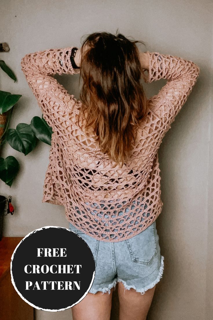 a woman with her back to the camera wearing shorts and a crochet top