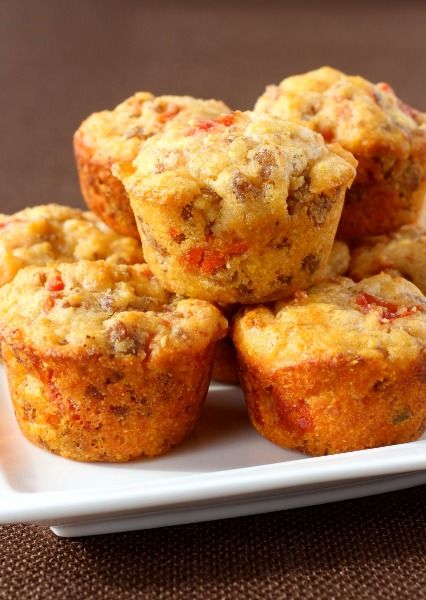 a white plate topped with muffins on top of a table