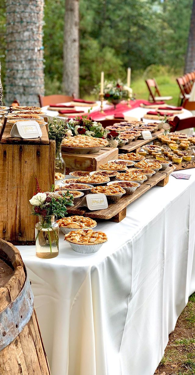 a table full of pies and pastries on it